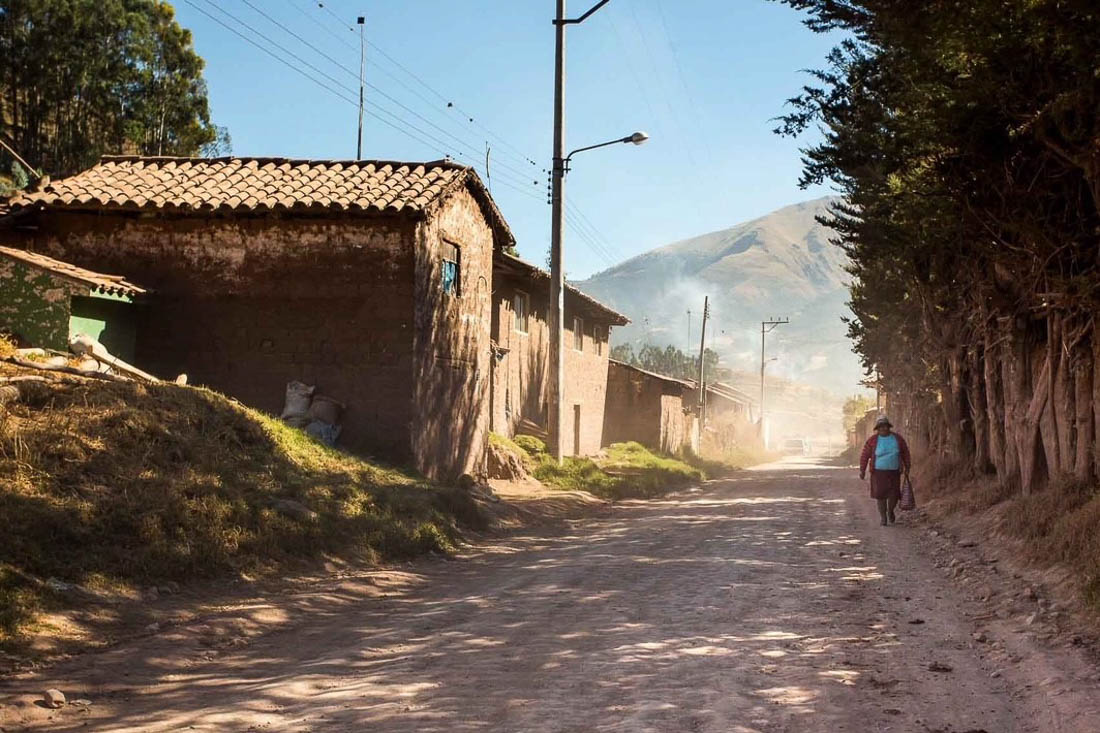 A Quechua Woman Walks Through Her Villiage