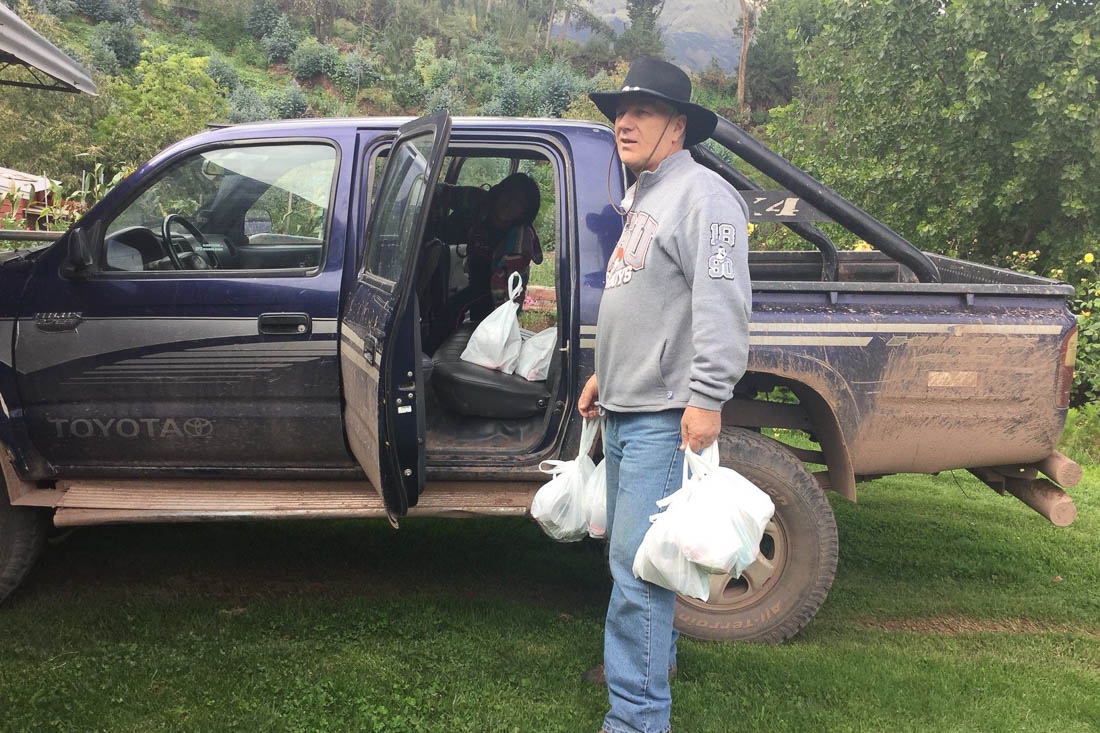 Keith Loads Medical Supplies into His 4-wheel Drive Truck