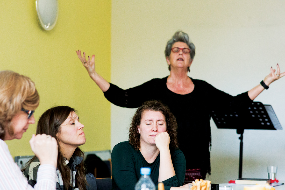 Tammie Matlack leads a time of prayer during a Berlin vision trip